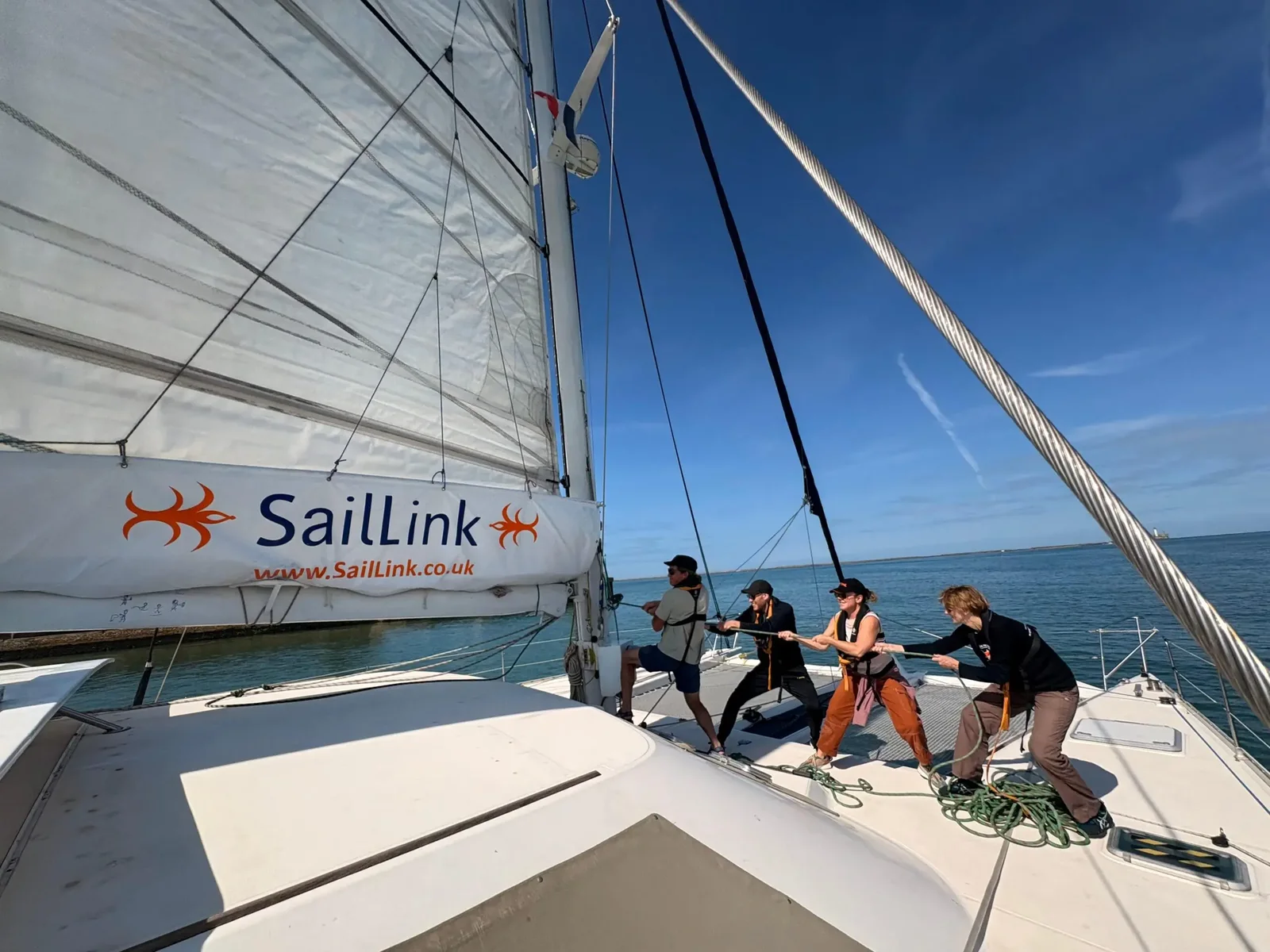 SailLink sailing catamaran with passengers